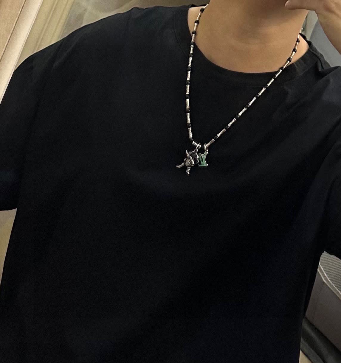 Louis Vuitton Silver and Black Beaded Necklace with Astronaut Charm